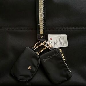 Lululemon dual pouch wristlet Black and Gold, key chain purse.
